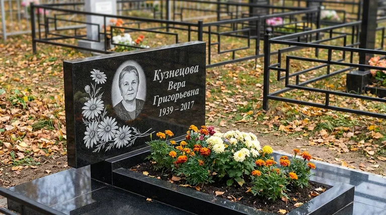 Памятник с гравировкой ромашек — выполненная работа «Кузнецова» в Нижневартовске