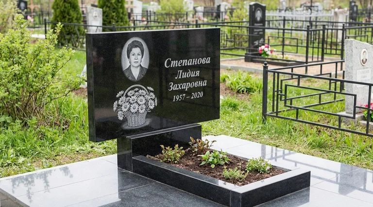 Памятник с гравировкой ромашек — выполненная работа «Степанова» в Нижневартовске
