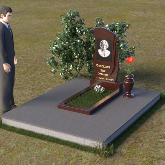 Памятник из гранита с резным крылом, в Якутске